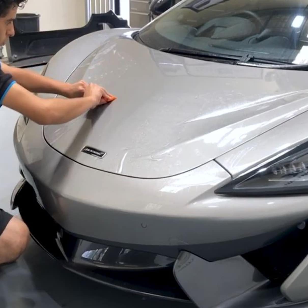 paint protection wrap being applied