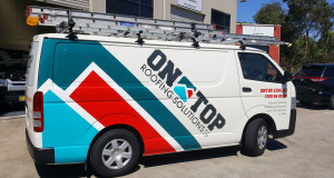 on top roofing solutions van signage